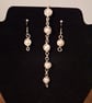 Silver wire wrapped pearl bracelet and matching earrings