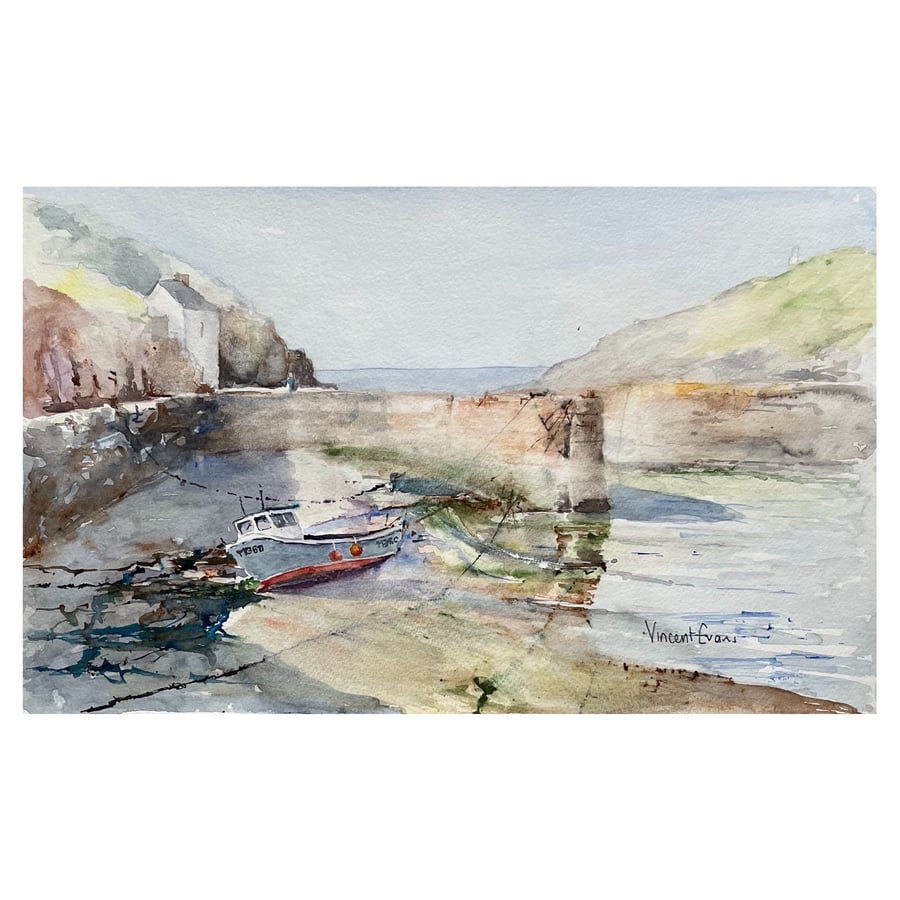 Protected Fishing Boat Tethered At Low Tide