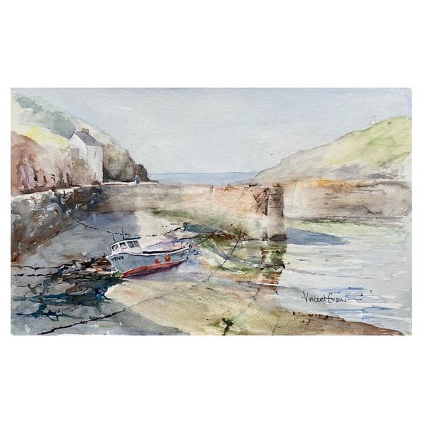 Protected Fishing Boat Tethered At Low Tide