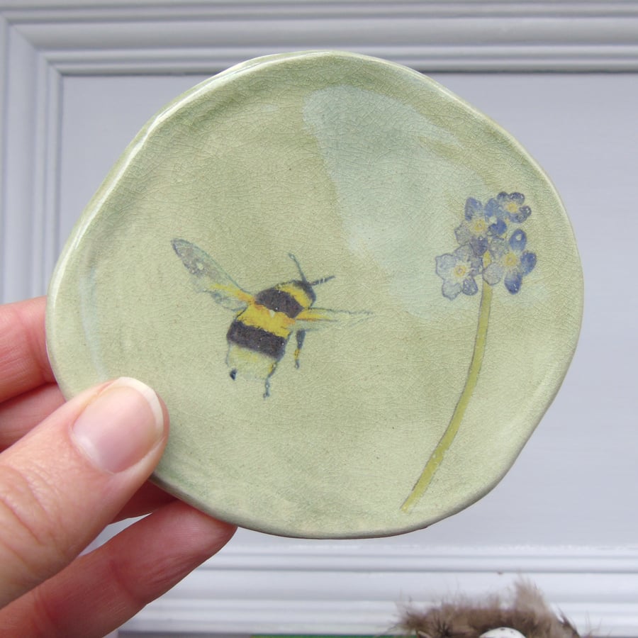 handmade ceramic bee and forget me not plaque