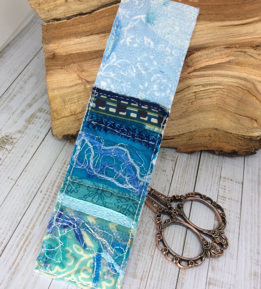 Upcycled embroidered seascape bookmark. 