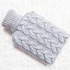 Hand knitted hot water bottle cover, cosy in grey. Rustic bedroom, home decor