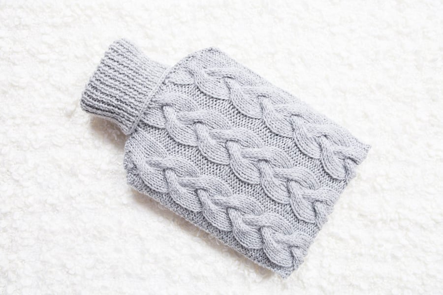 Hand knitted hot water bottle cover, cosy in grey. Rustic bedroom, home decor