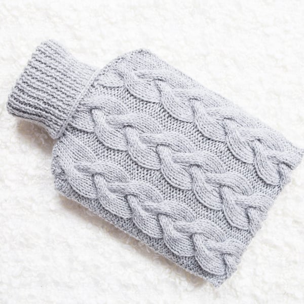 Hand knitted hot water bottle cover, cosy in grey. Rustic bedroom, home decor