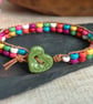 Multicoloured howlite bead and leather bracelet with green ceramic heart button - Image 4