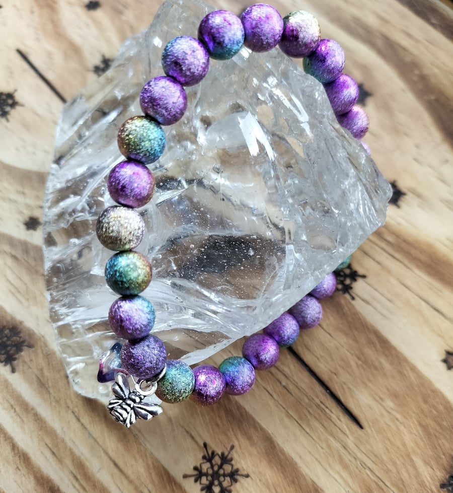 Purple and blue miracle bead bracelet with bee