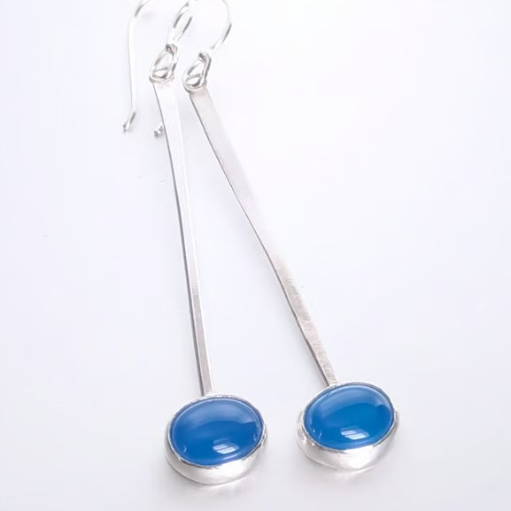 Eye catching long dangle blue onyx earrings