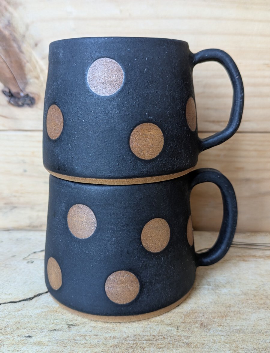 Spotty black toasted mugs