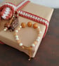Handmade bracelet made using pre-loved beads. - Image 4