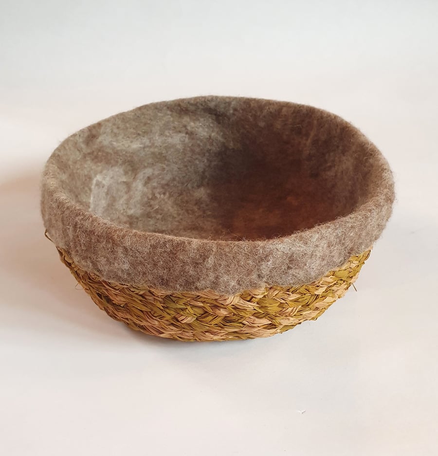 Shallow raffia and felted wool basket