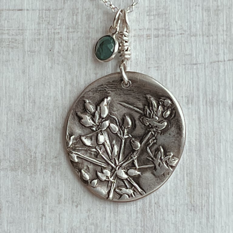 Botanical  sterling silver pendant with emerald charm.