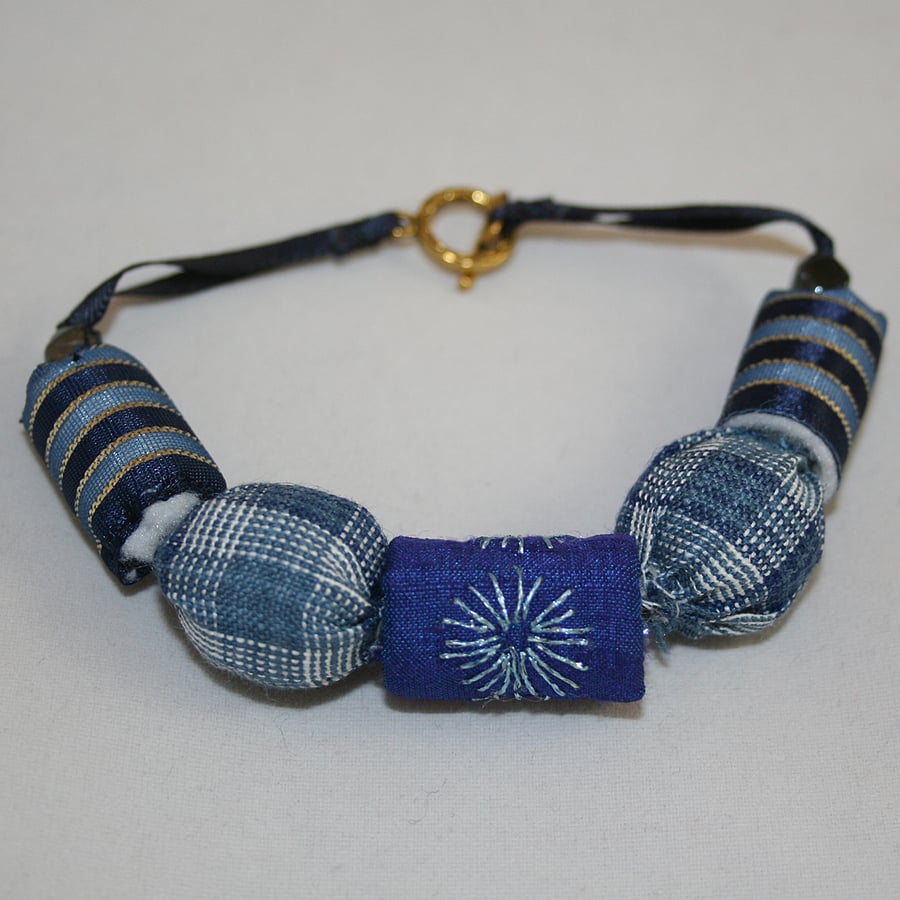 Bracelet of Hand-stitched textile beads