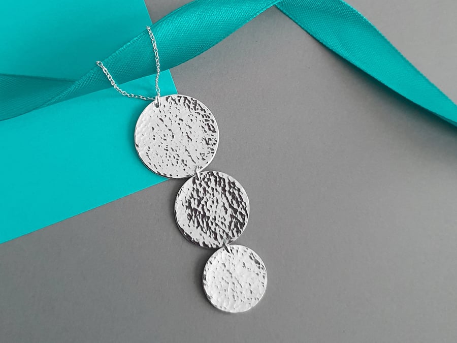 Hammered silver disc on sale necklace