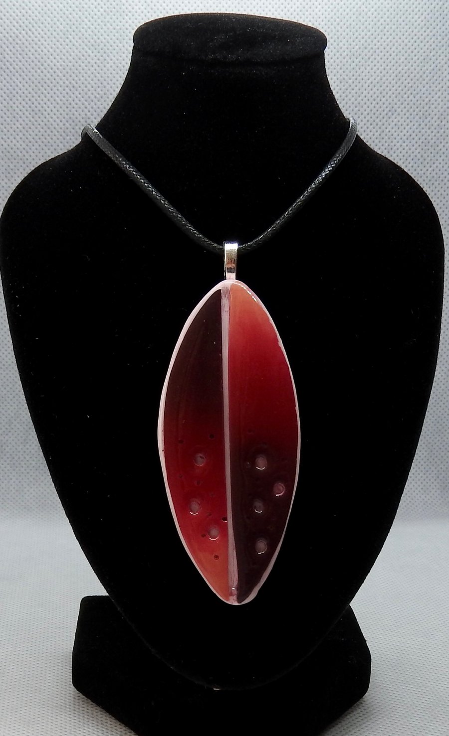 Dark red cut out pendant 