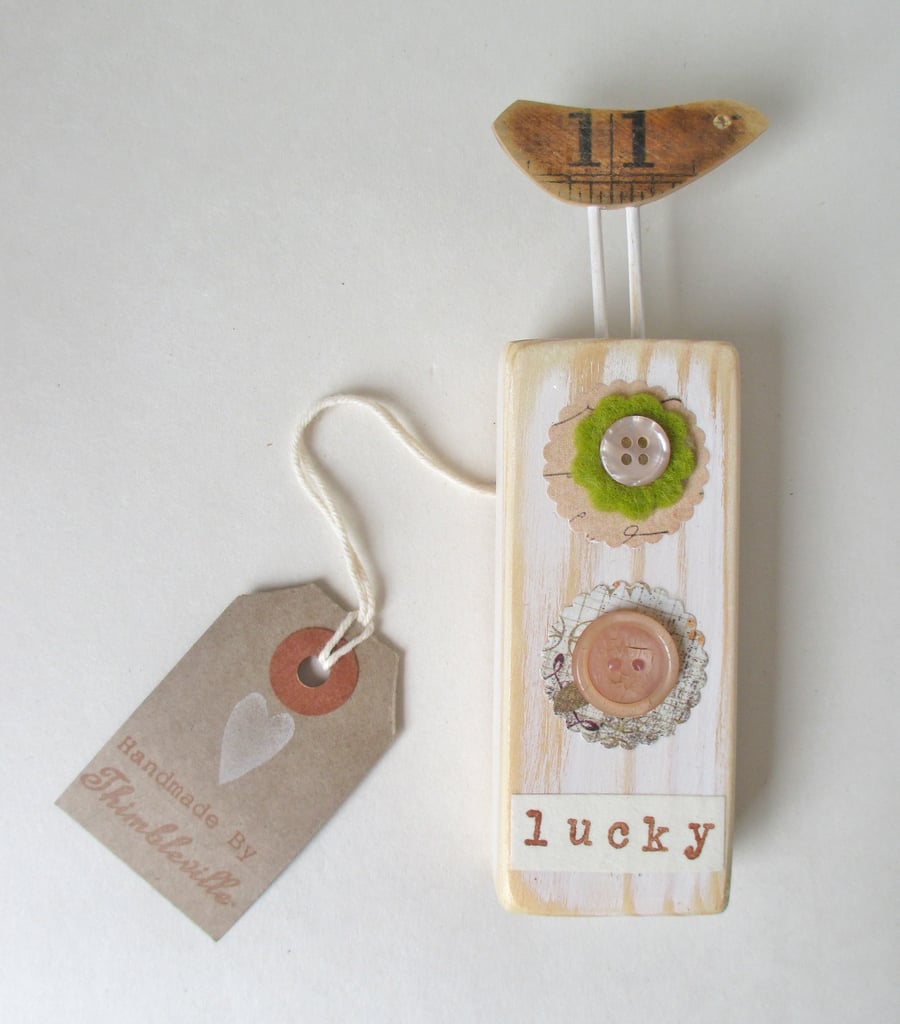 Sale-was 12.00 now 6.00 Wooden Bird Hanging with Button Flowers