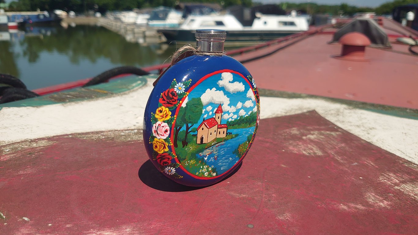 Hand painted rose and castle hip flask 