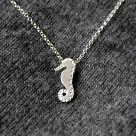 Mini silver seahorse pendant