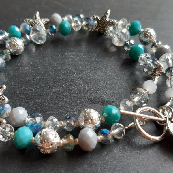 Sparkling coves Tibetan Silver, Crystal & Lava Front Fastening necklace