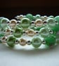 SHADES OF GREENS AND CREAM LAMPWORK BEAD BRACELET.  575 - Image 2