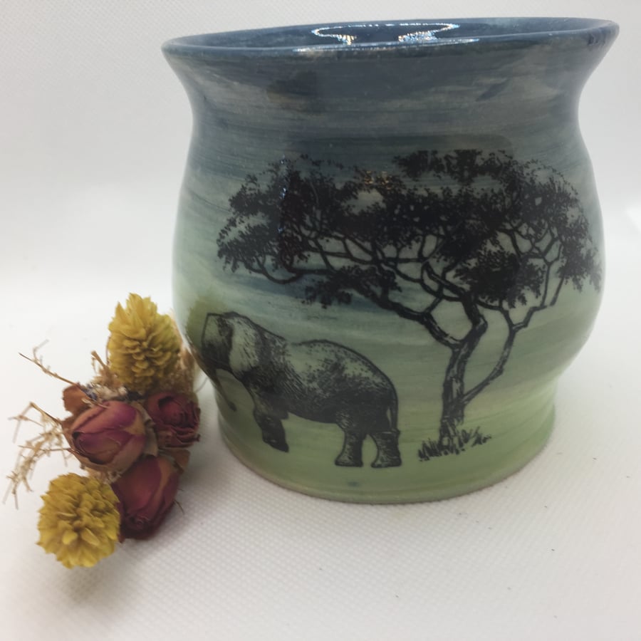 Vase decorated with elephants