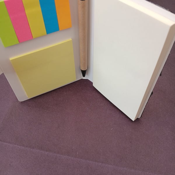 Handbag sized notepad with writing pad, sticky notes and colourful index pads.