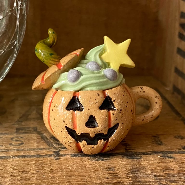 Tiny ceramic pumpkin magic potion decoration