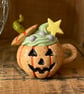 Tiny ceramic pumpkin magic potion decoration