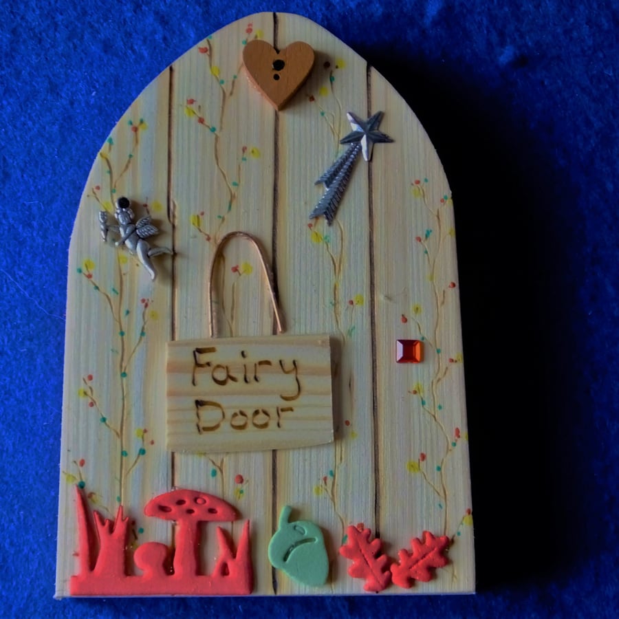 Wooden fairy or hobbit door to let the fairies into your home or garden 