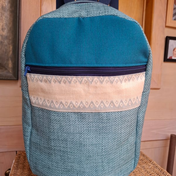 Light blue and brocade backpack