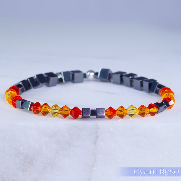 Bracelet handmade with Swarovski and Hematite beads stretchy black and orange
