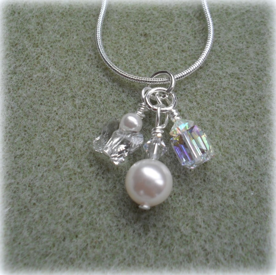 Charm Necklace With Crystals and Pearls From Swarovski Silver Plate