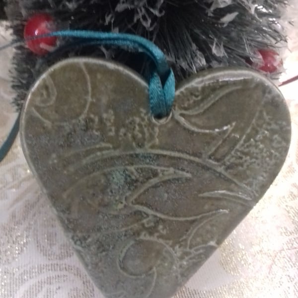 Handmade ceramic green heart hanging decoration 