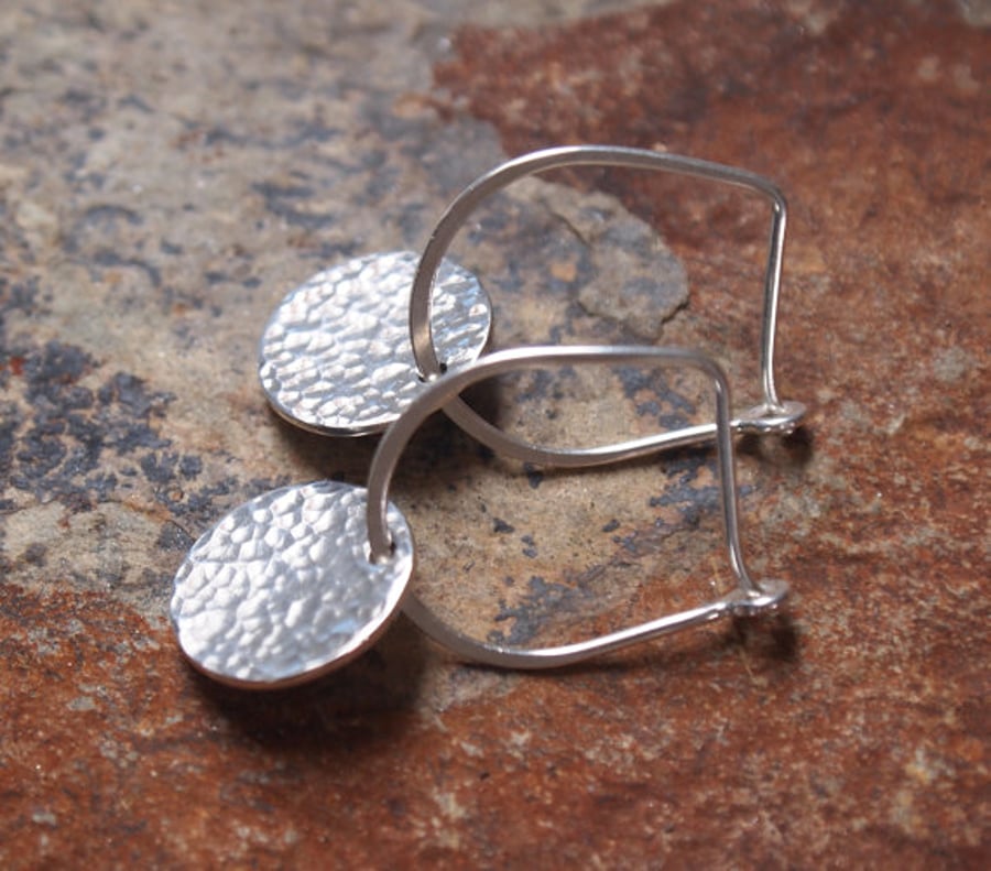 Sterling silver drop earrings with hammered disc 