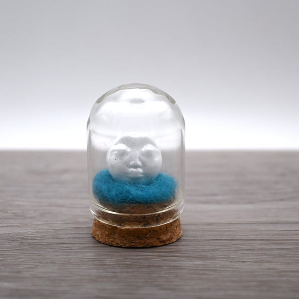 small glass glitter man in the moon figure