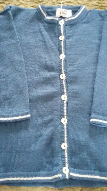 Blue boxy jacket. Size 7-8 years Seconds Sunday