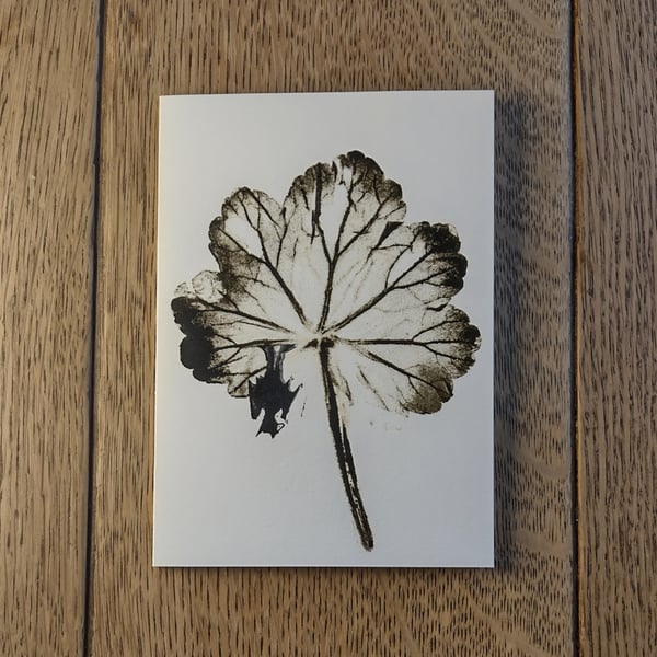 Roosting Bat. Image made on a printing press and hand made stamps.