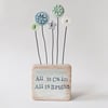 Clay Snowflakes and Buttons in a Painted Wood Block 'All is Calm All is Bright'