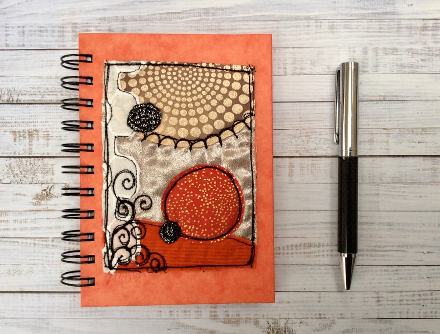 Embroidered up-cycled klimt inspired A6 lined notebook.