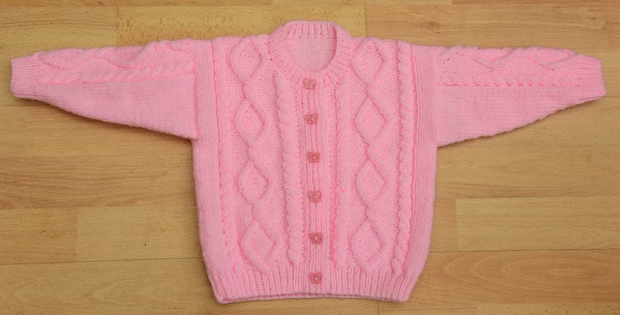 hand knitted aran style cardigan  chest 46cms age 6 to 12 months in pink