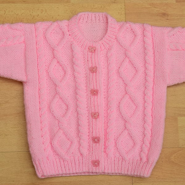 hand knitted aran style cardigan  chest 46cms age 6 to 12 months in pink