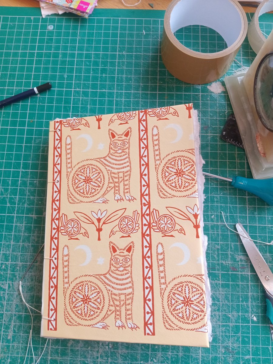 Coptic stitch watercolour sketchbook A5 cat woodblock print cover handbound 