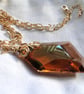 Wire wrapped copper coloured Swarovski Crystal Pendant on a gold chain Rare - Image 5