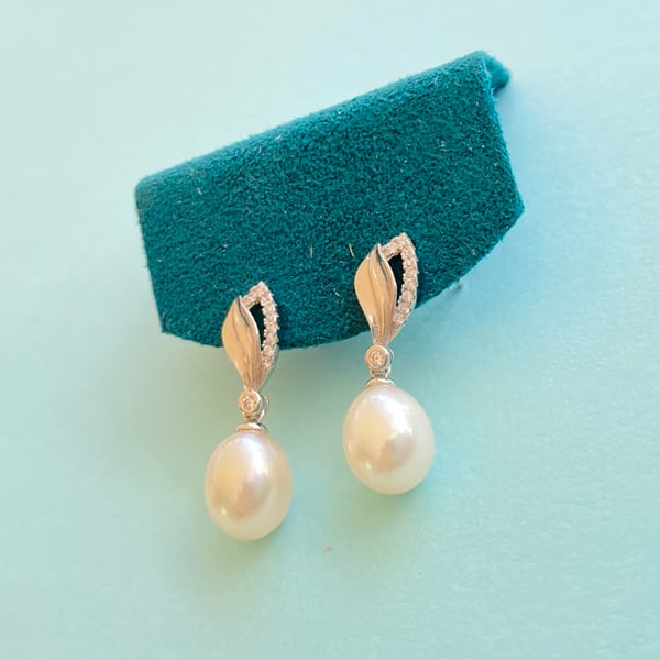 White Oval Freshwater Pearl Sterling Silver Earrings