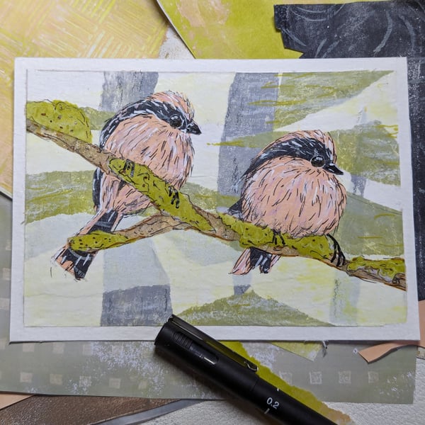 Mixed media collage of two long tailed tits