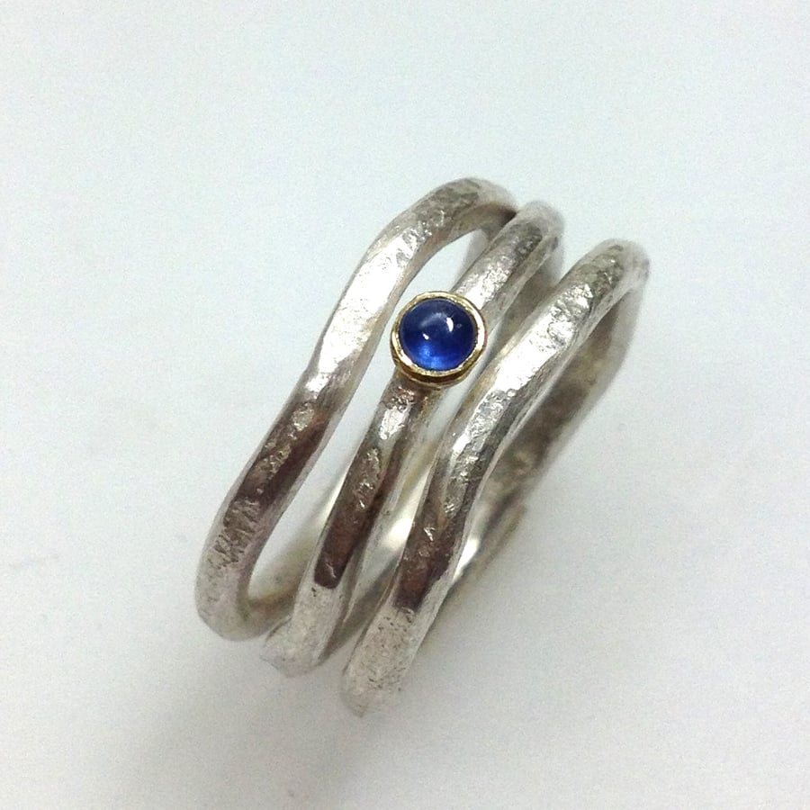Silver 18ct gold and sapphire wave ring stack