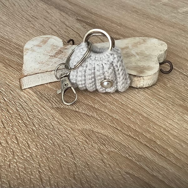 Small bag key, ear buds, coins holder