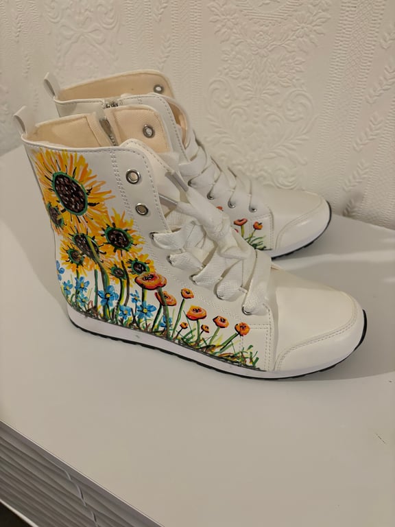 A pair of hand painted and sealed boots by Andrew Jenkins 