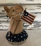 A charming primitive patriotic mouse pin cushion