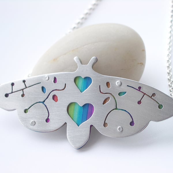 Moth pendant with rainbow colours