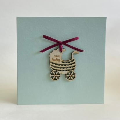 New baby card with detachable pram decoration